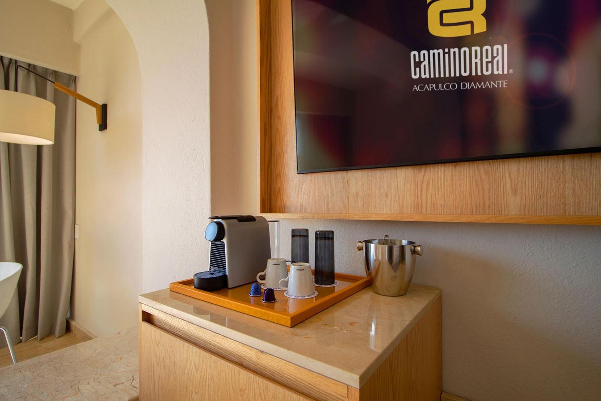 Hotel Camino Real Acapulco Diamante Exterior foto A Nespresso machine in a hotel room